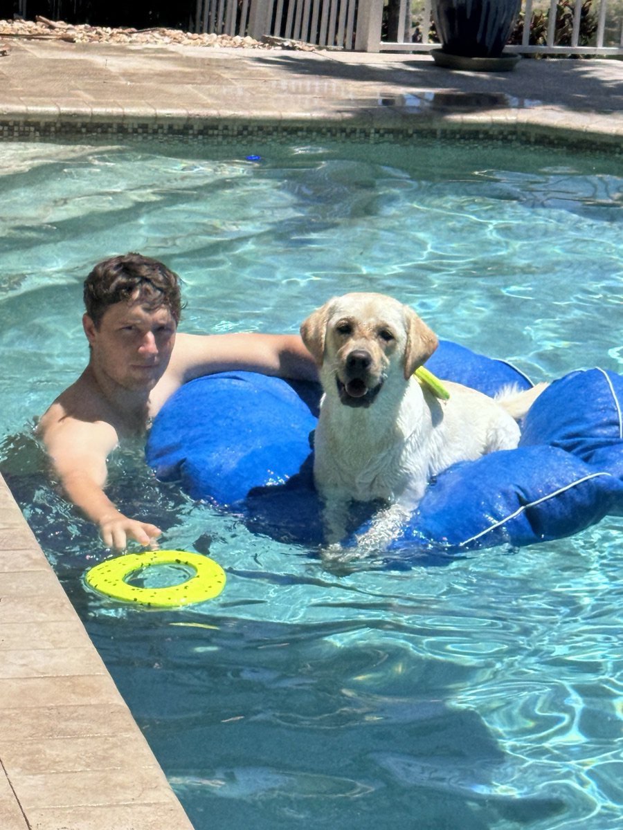 Austin Smith with Aspen in the pool